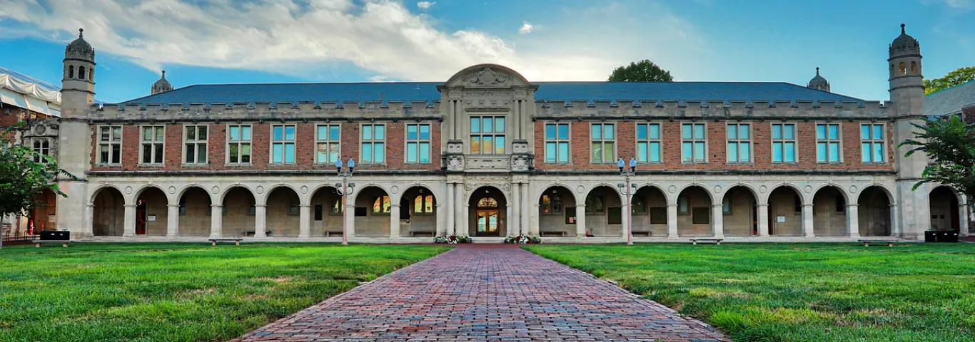 Ridgley Building, green grass and blue sky