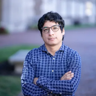 Rivas Echarri smiling with a campus background